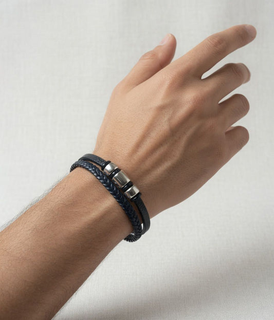 Black braided leather bracelet with metallic clasp