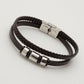 Black braided leather bracelet with metallic clasp