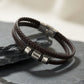 Black braided leather bracelet with metallic clasp
