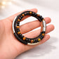 Leather Bracelet with black and orange beads